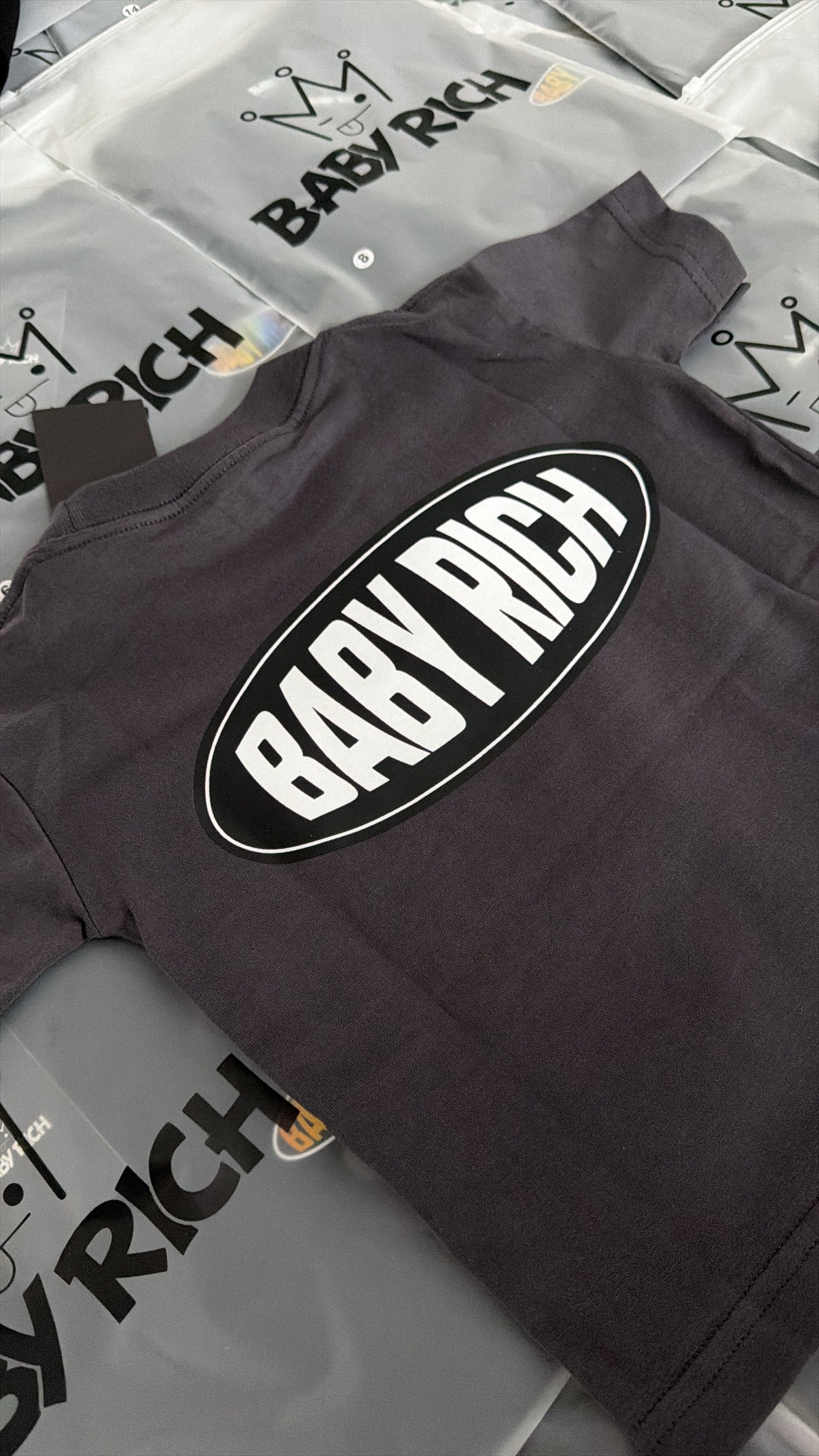 DROP #03 — OVAL ERA CHARCOAL